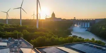 Solar panels, wind turbines, and hydroelectric dam symbolizing federal renewable energy investment.