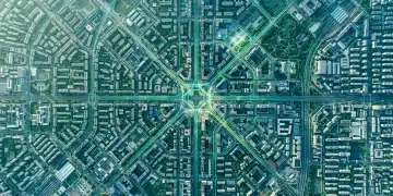 Aerial view of a city grid at sunrise with glowing green digital pathways representing interconnected benefit data streams.