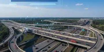 Modern highway interchange with bridges, symbolizing the impact of the 2026 Infrastructure Bill on transportation.